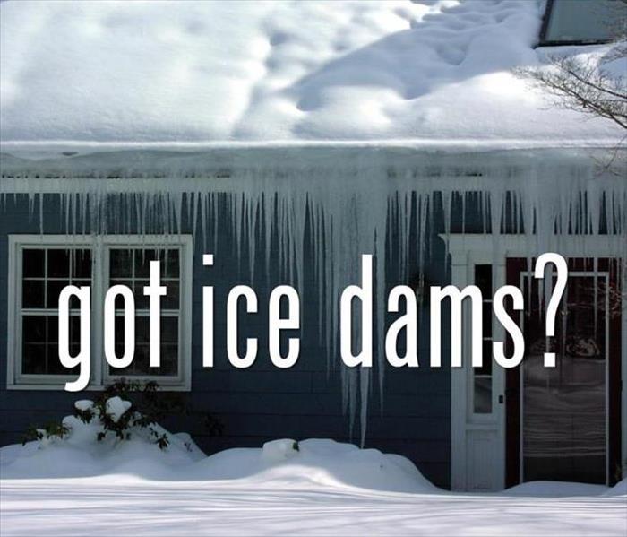 got ice dams? on a background of a icicle encrusted roof